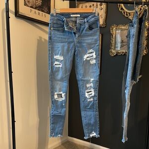 Distressed Blue Jeans